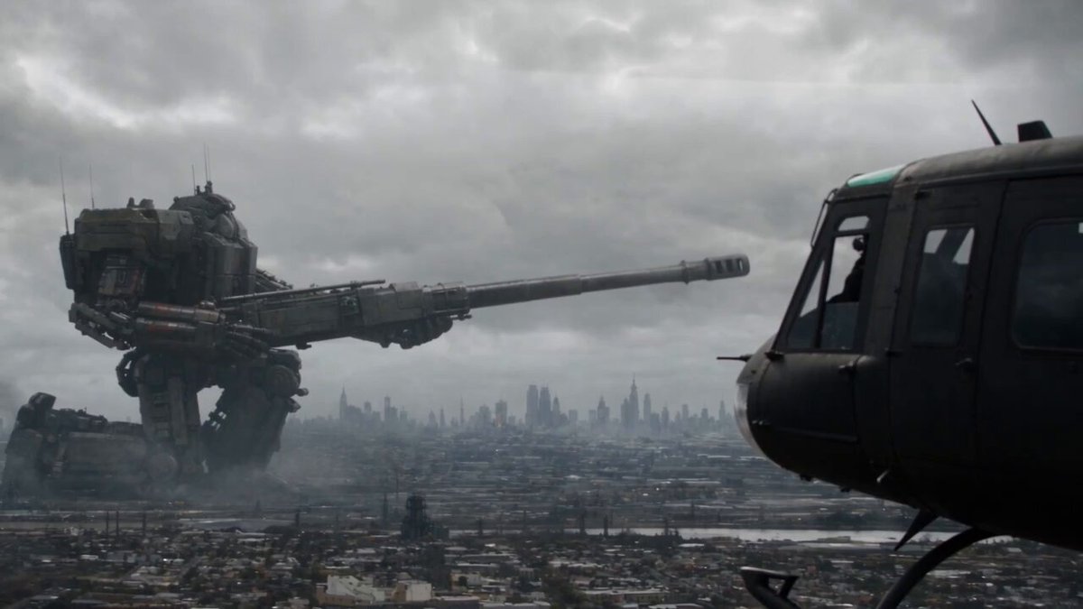 Giant mech battles kaiju
