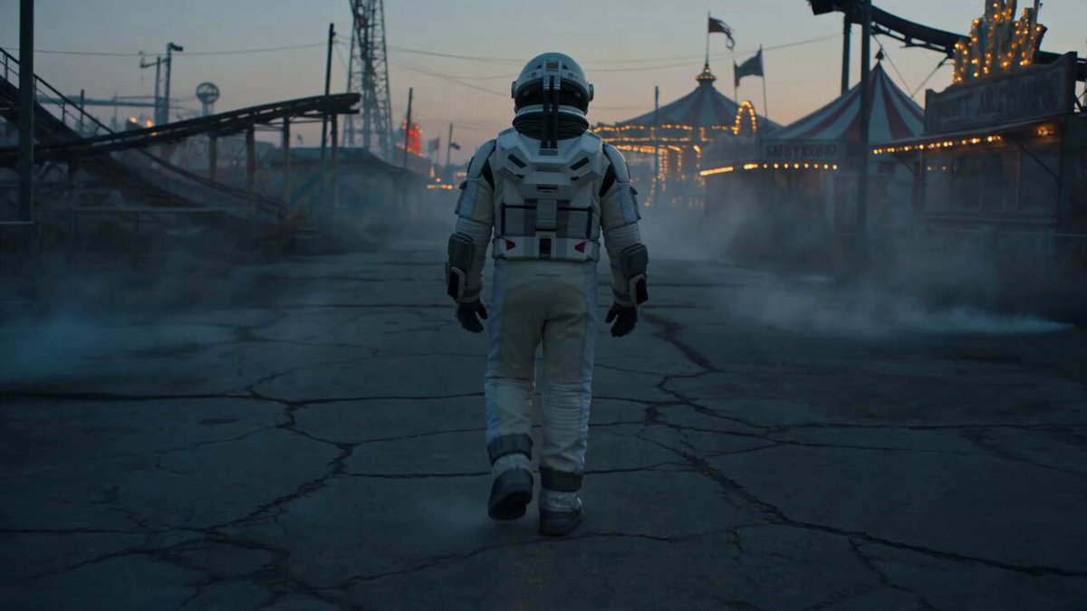 Astronaut in Abandoned Amusement Park